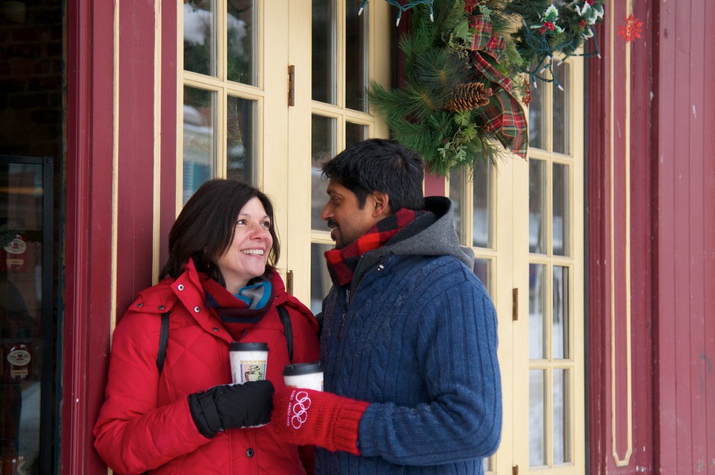Downtown Orillia couple in winter holding coffees