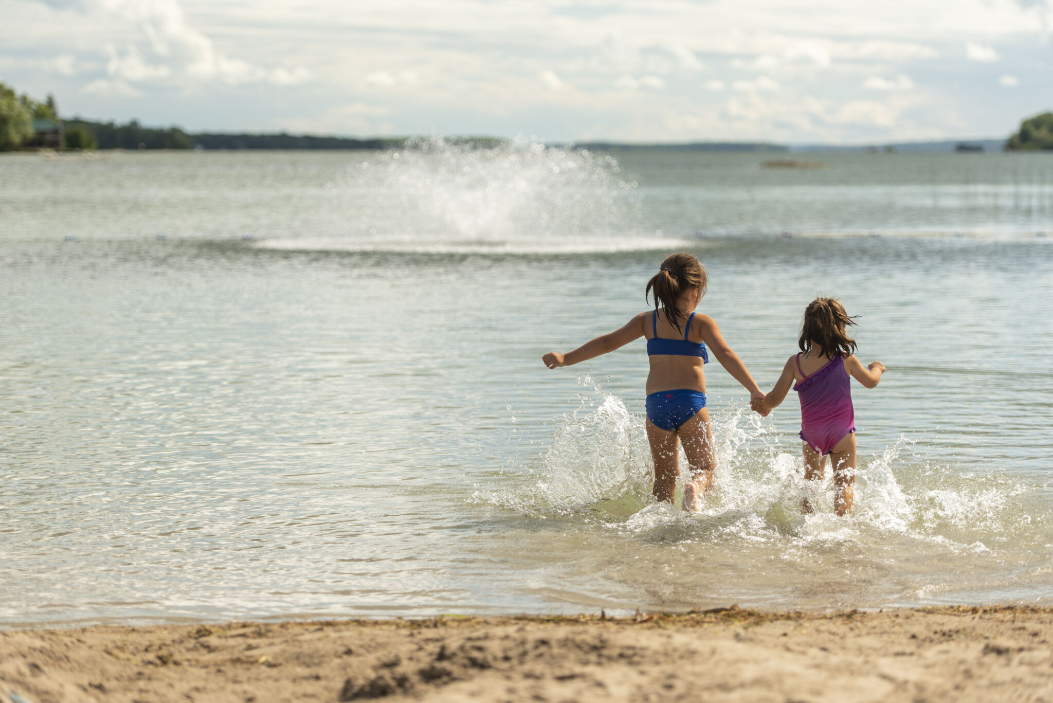 Kids enjoying warm waters at Severn beach
