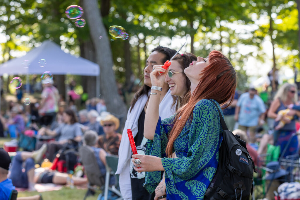 Mariposa Folk Festival attendee blowing bubbles. Photo by Deb Halbot